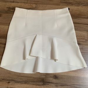 White ruffle high low mini skirt